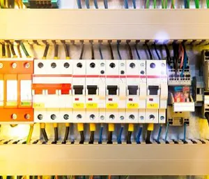 electrical panel with circuit breakers and wires