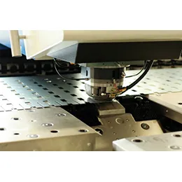 METAL STAMPING FOR COMMERCIAL LIGHTING APPLICATIONS