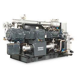 High pressure oil-free reciprocating piston compressors