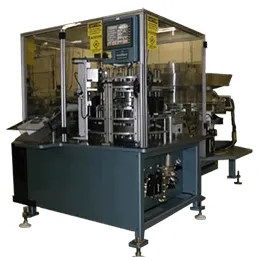 CONTINUOUS MOTION CAP CLOSING MACHINE