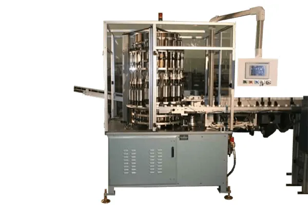 CONTINUOUS MOTION MULTIPLE PIECE ASSEMBLY MACHINE