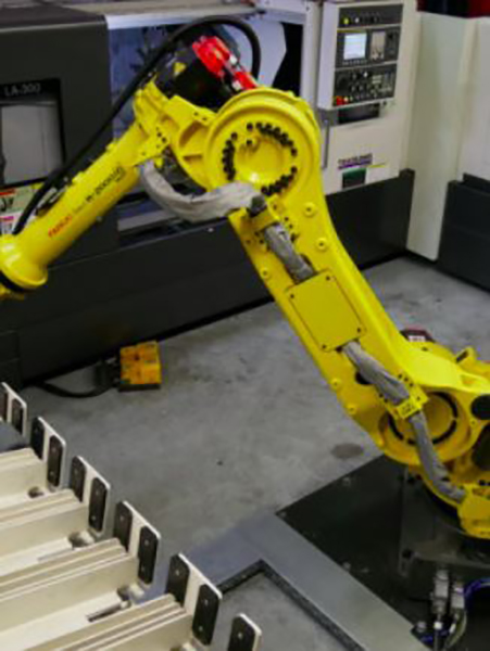 Robotized CNC machining center