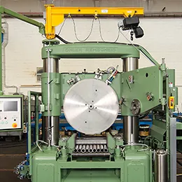 Conversion of the OHLER segmenteal circular sawing machines for use of carbide-tipped circular saw blades