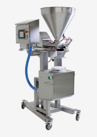Automated cake decoration system - Food and Drink Technology